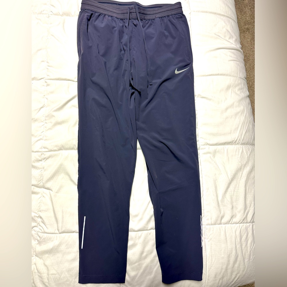 Women’s Nike dri-fit pants. Size Small. Purple color.